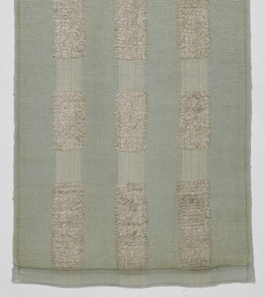 woven textile panel of mint and cream threads with looped fringe details