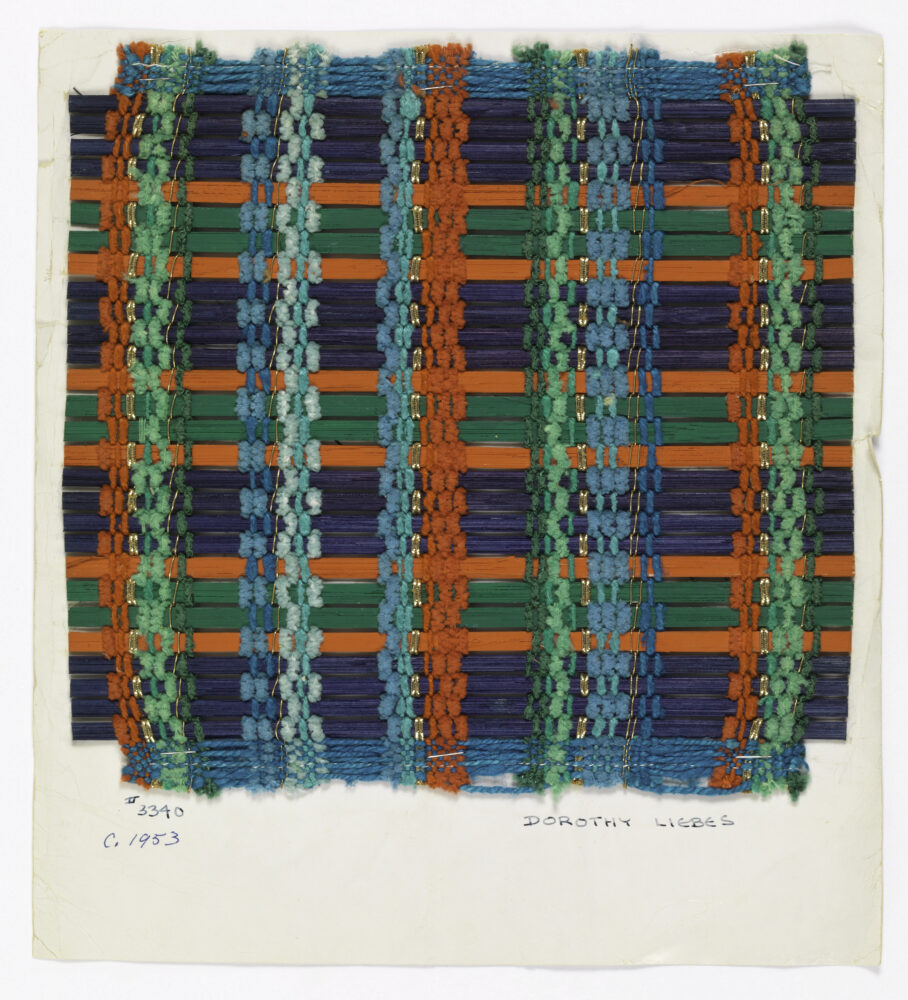 window blind sample of blue and orange rods with blue and green threads
