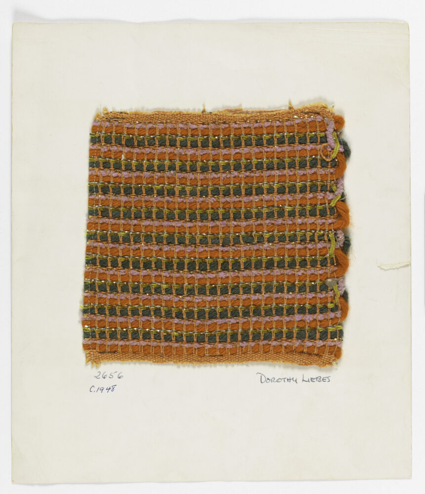 woven textile sample of orange and green threads