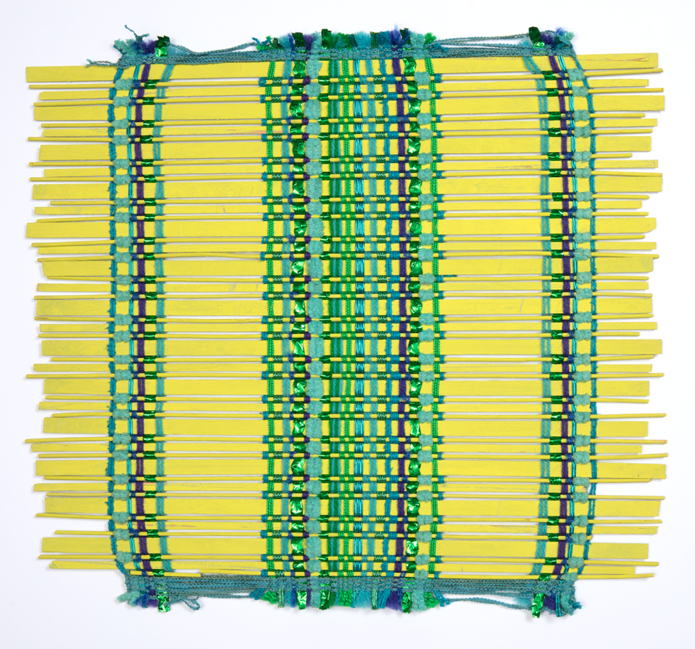 window blind sample of yellow rods and green threads