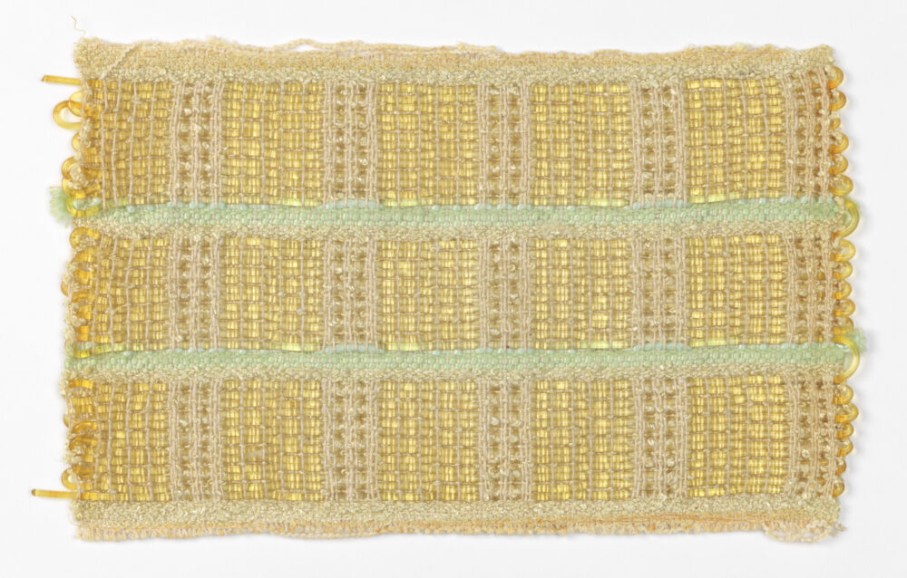 woven textile sample of yellow and mint threads