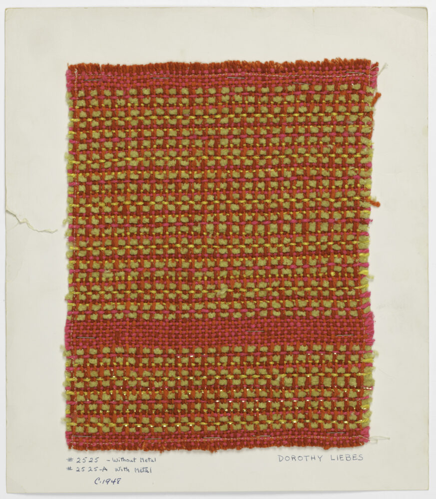 woven textile sample of yellow and magenta threads