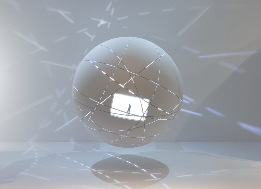 White spherical model with white light glowing from within is suspended in space. A rectangular cutout and several line cutouts appear in light and create delicate light projections on the surrounding surfaces.