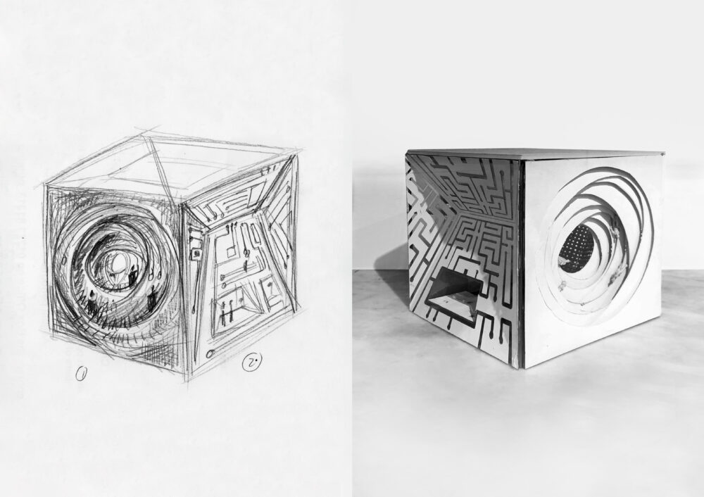 A drawing and photograph side by side depicting the same subject: a black-and-white cube with a maze design on one side and layered circle elements on another side, the internal overlaps and structures creating shadows.