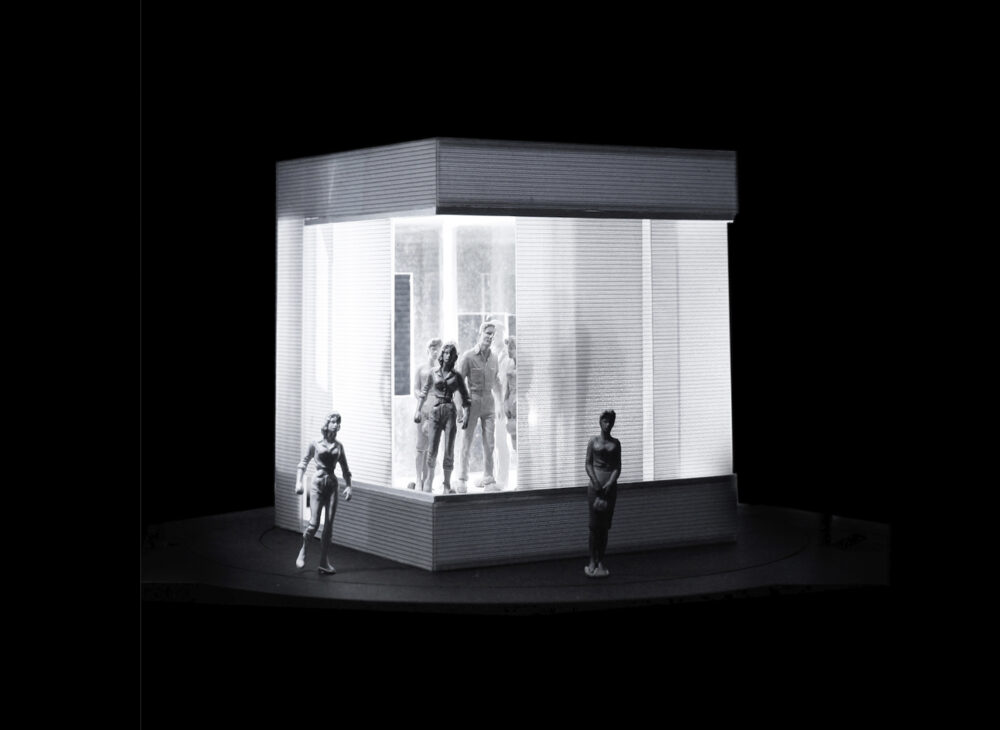 A cubic structure with open sides that are partly obstructed, in a black space. Several figures inside the structure are looking out toward the viewer. Two other figures stand outside of the structure.