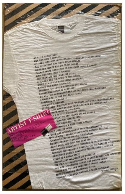 Cotton T-shirt with text of various Jenny Holzer Truisms wrapped in cellophane